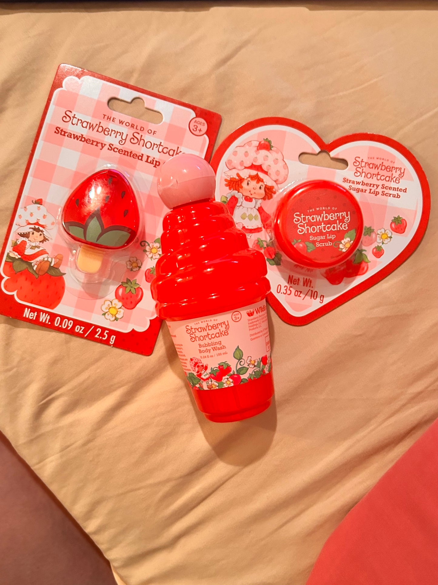 Strawberry Shortcake Lip Gloss, Sugar Lip Scrub, and Bubbling Body Wash collection