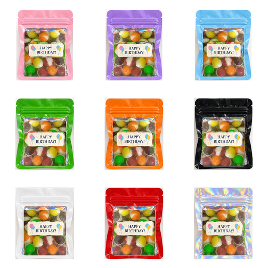 All nine personalized birthday favor bag colors filled with real photographed rainbow bites