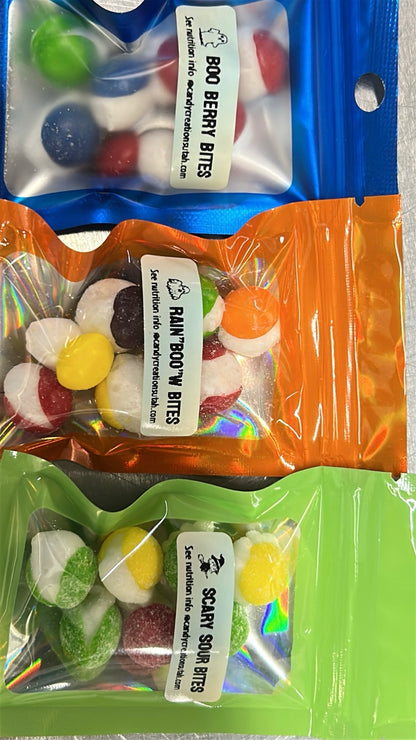 Three Halloween freeze-dried candy mini favor bags showing Boo Berry, Rainbow, and Scary Sour varieties